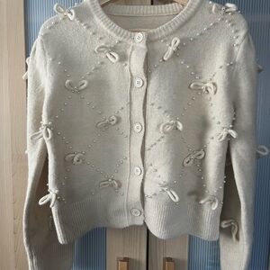 Bows and Pearls wool cardigan